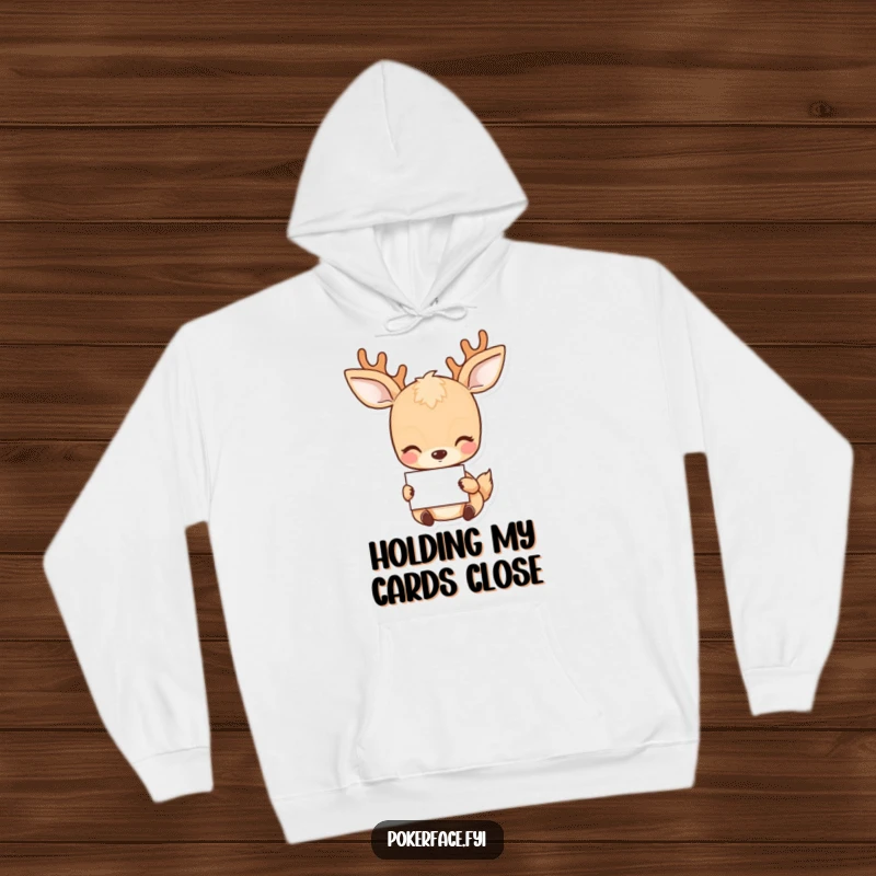 Funny Deer Hoodie: Placid deer character with a neutral gaze holding a card, offering cozy humor.