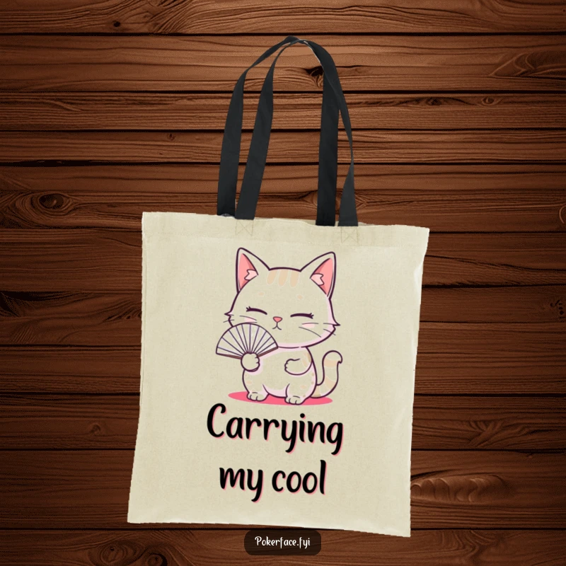 Funny tote bag showcasing a cat with a blank expression holding a fan, a humorous and stylish accessory.